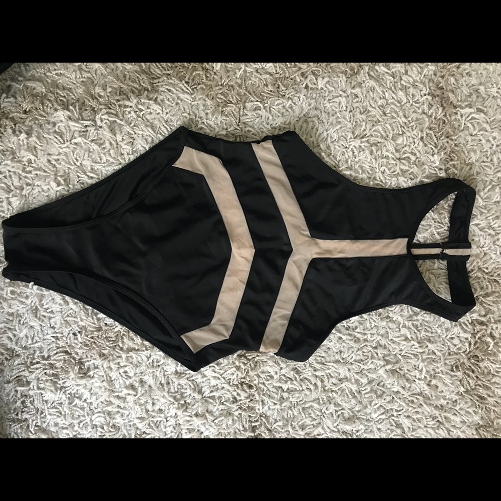Black leo with mesh, worn once